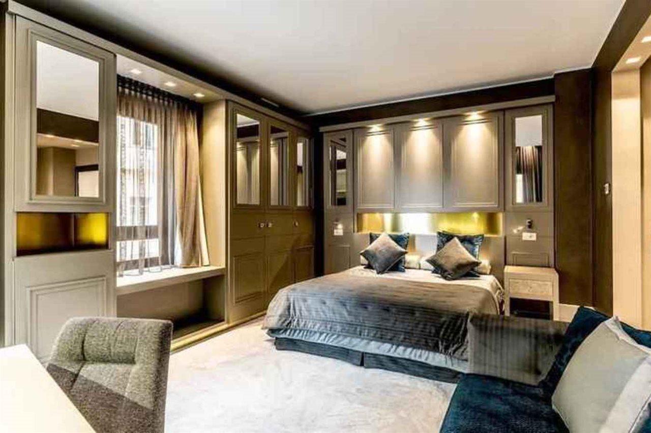 Hotel Palazzo Doglio Cagliari Exteriér fotografie A bedroom
